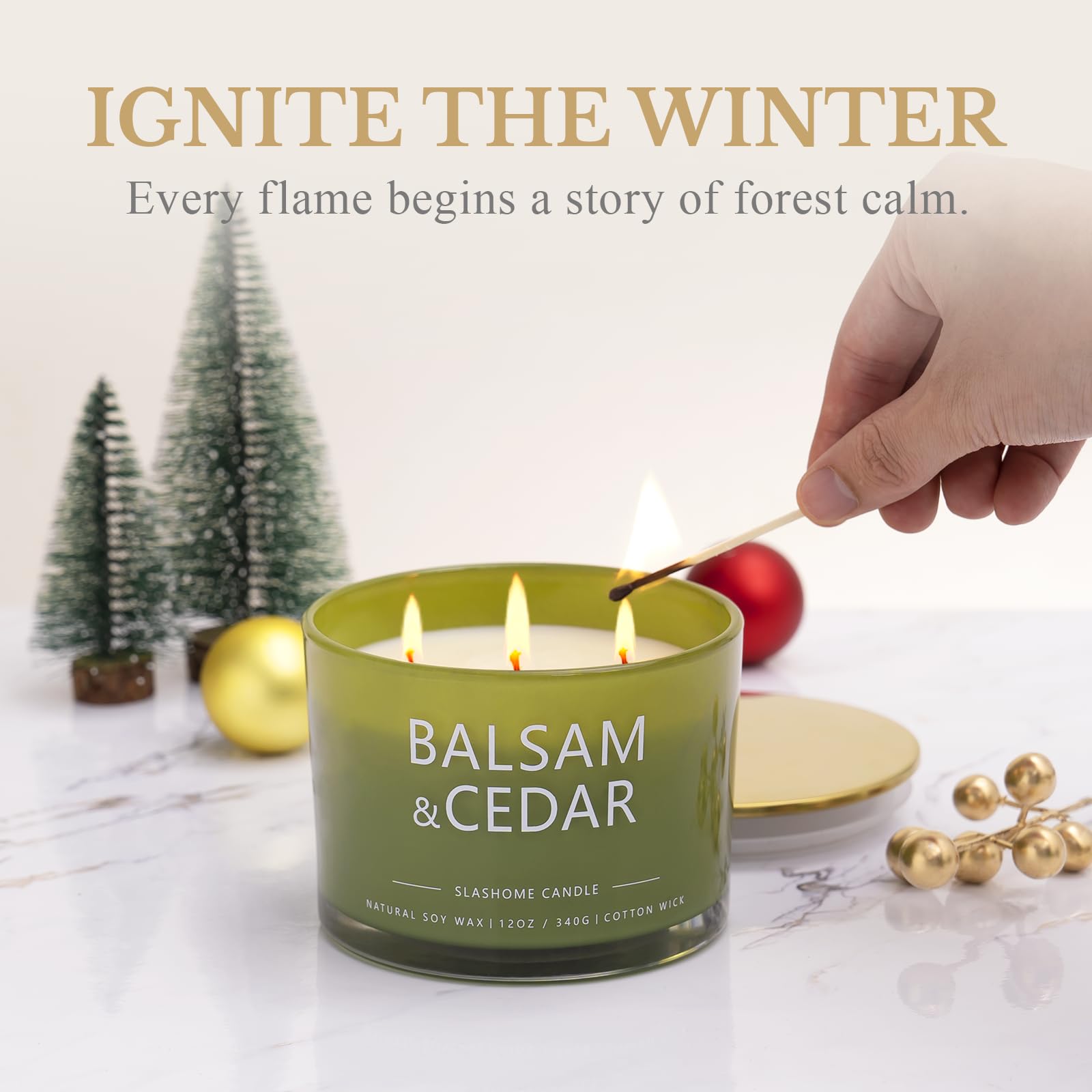 Candle on a winter table with Christmas decor