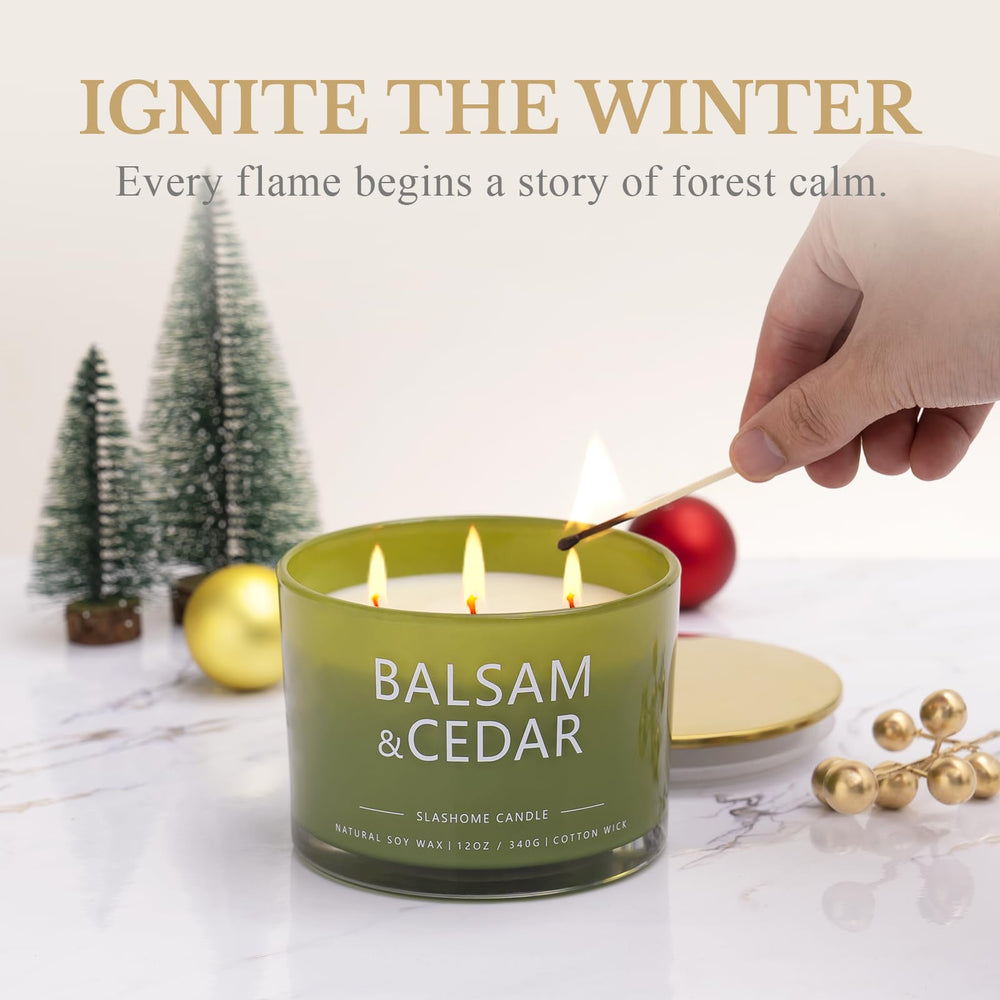 Candle on a winter table with Christmas decor