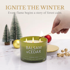 Candle on a winter table with Christmas decor