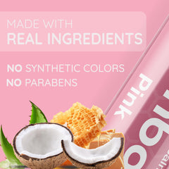Bambalo lip balm ingredients scene highlights natural oils and beeswax.