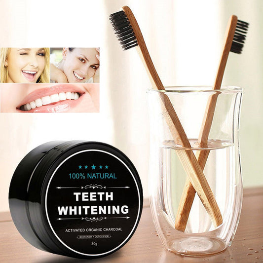 Bamboo toothbrush with charcoal whitening powder