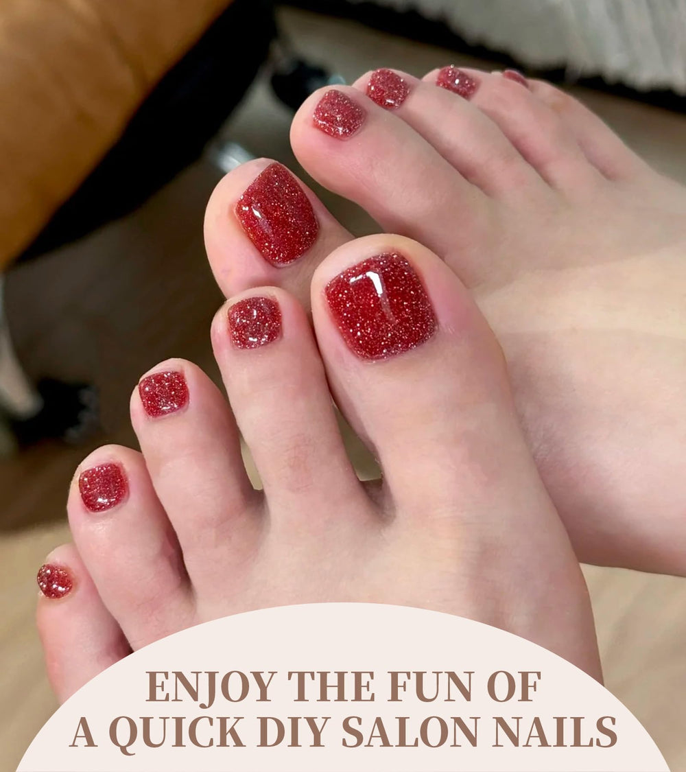 Banmagately toe gel stickers rose red strips closeup highlighting glossy salon finish.
