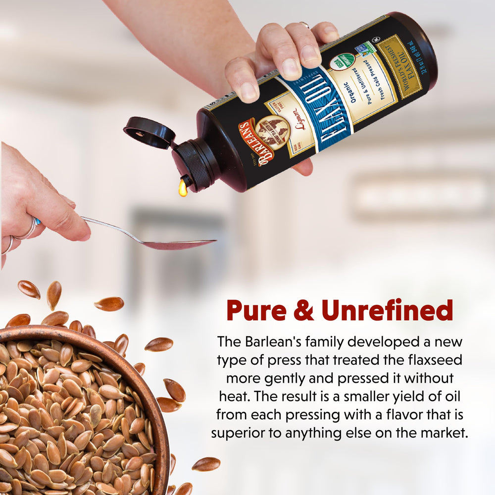 Pouring Barlean's Lignan Flaxseed Oil from a spoon