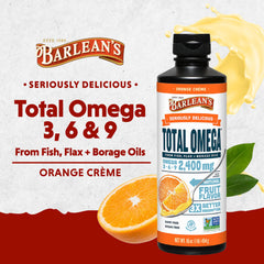 Pouring Barlean's Omega 3-6-9 Orange Creme liquid from the bottle