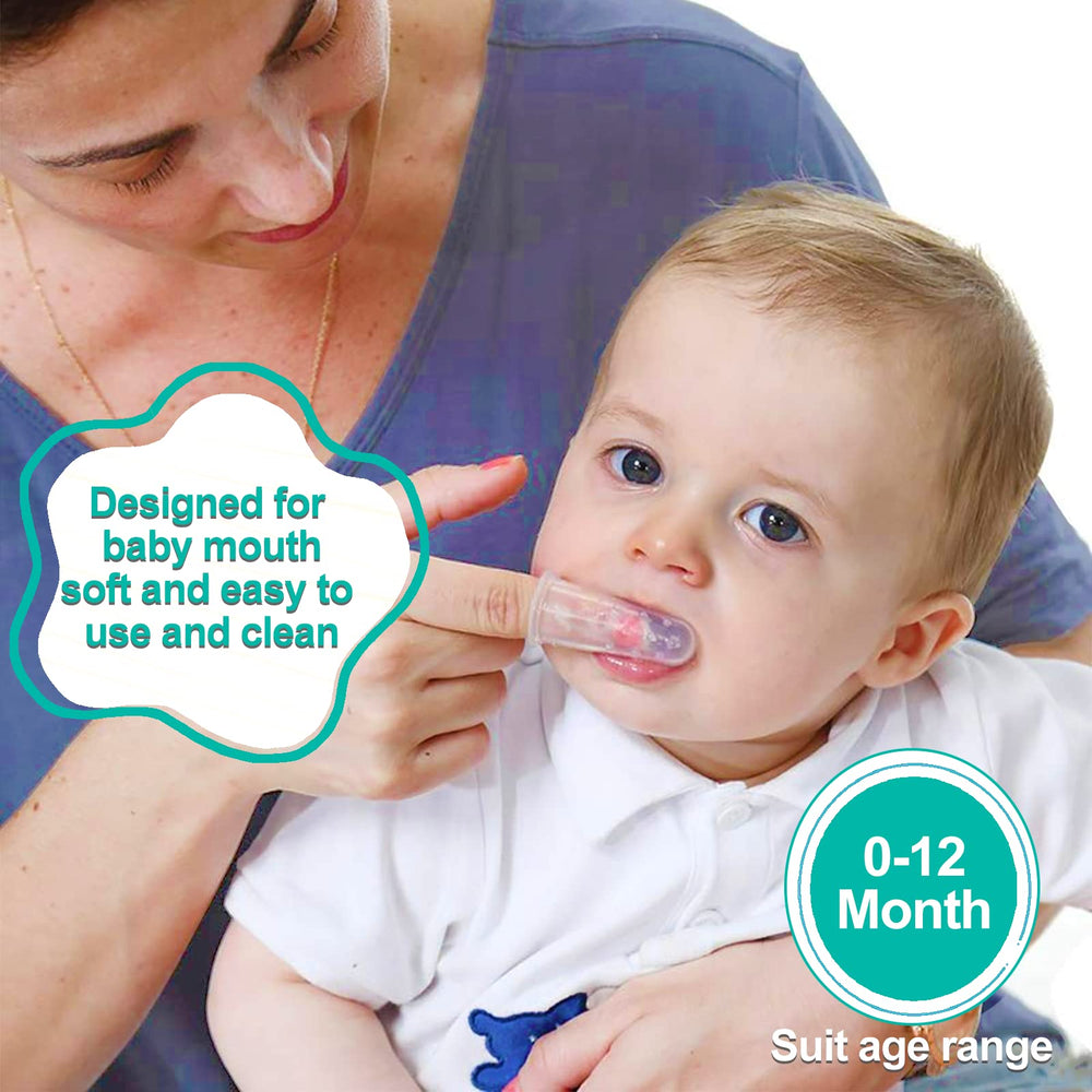 Silicone finger toothbrush on adult finger