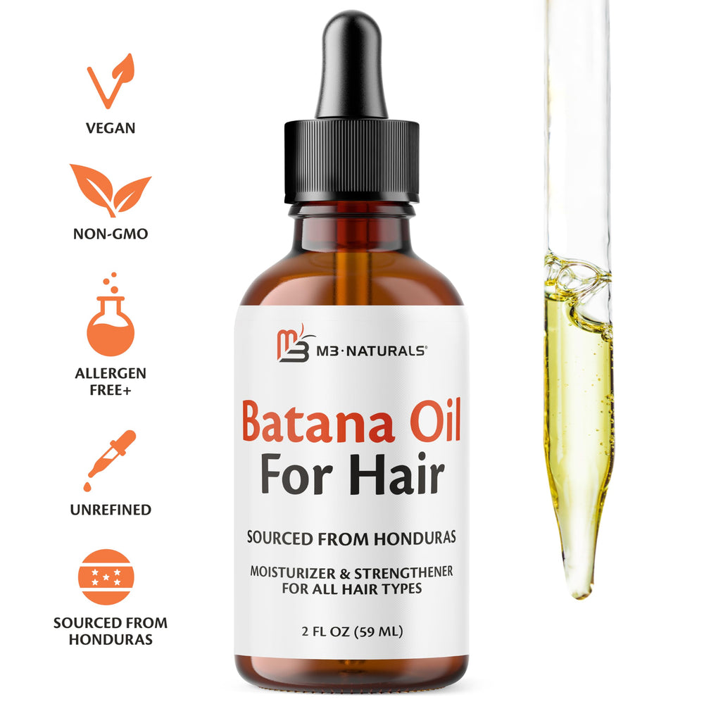 Applying Batana oil to hair and skin
