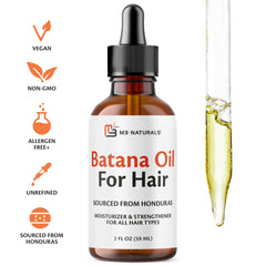 Applying Batana oil to hair and skin