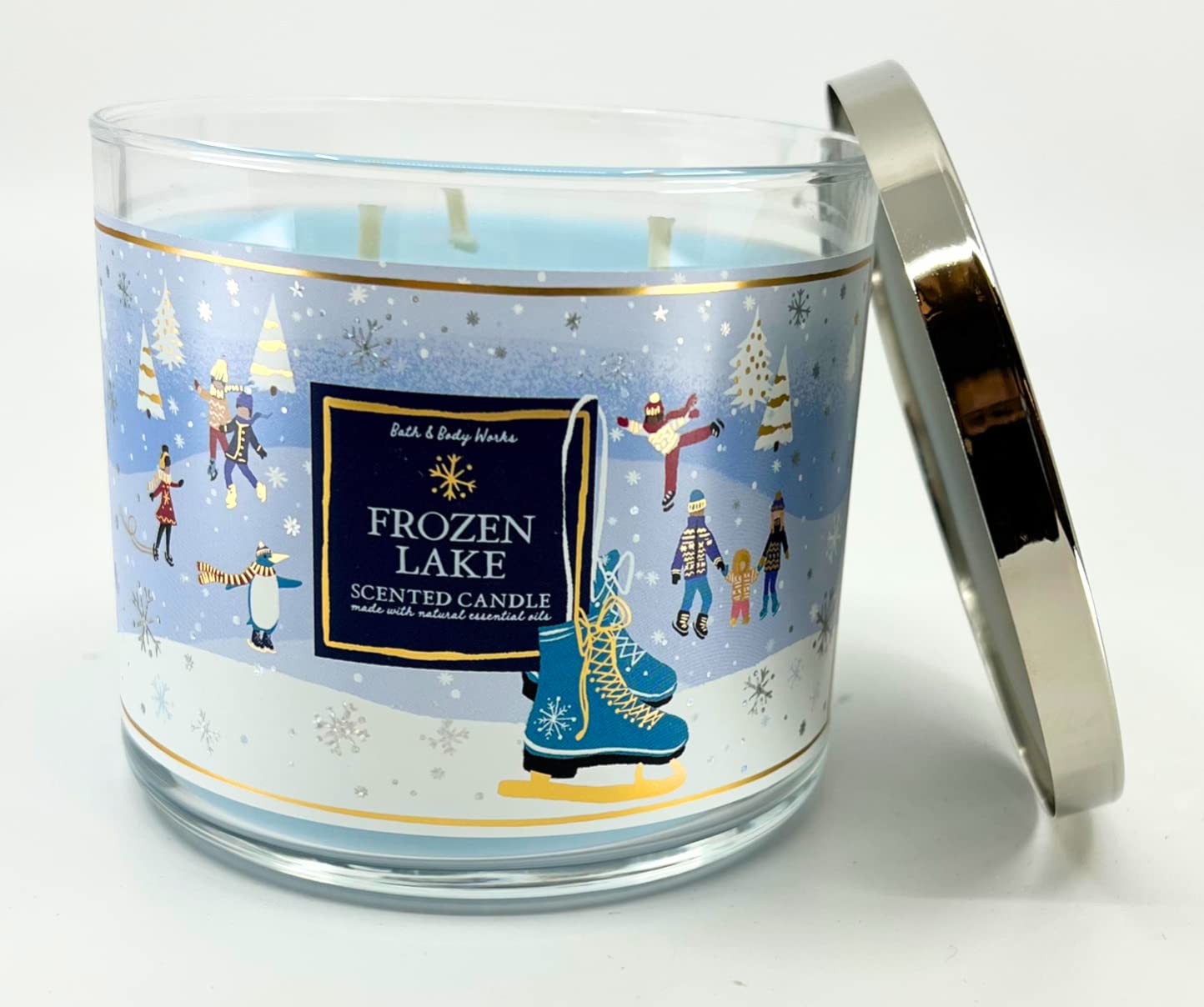 Close-up of Frozen Lake candle label with White Barn branding