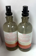 Close-up of Bath & Body Works Aromatherapy Pillow Mist orange and ginger labels