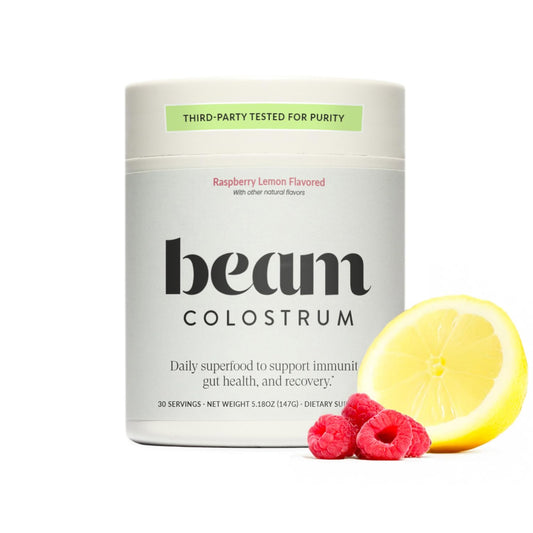 Beam Colostrum Powder bottle with label