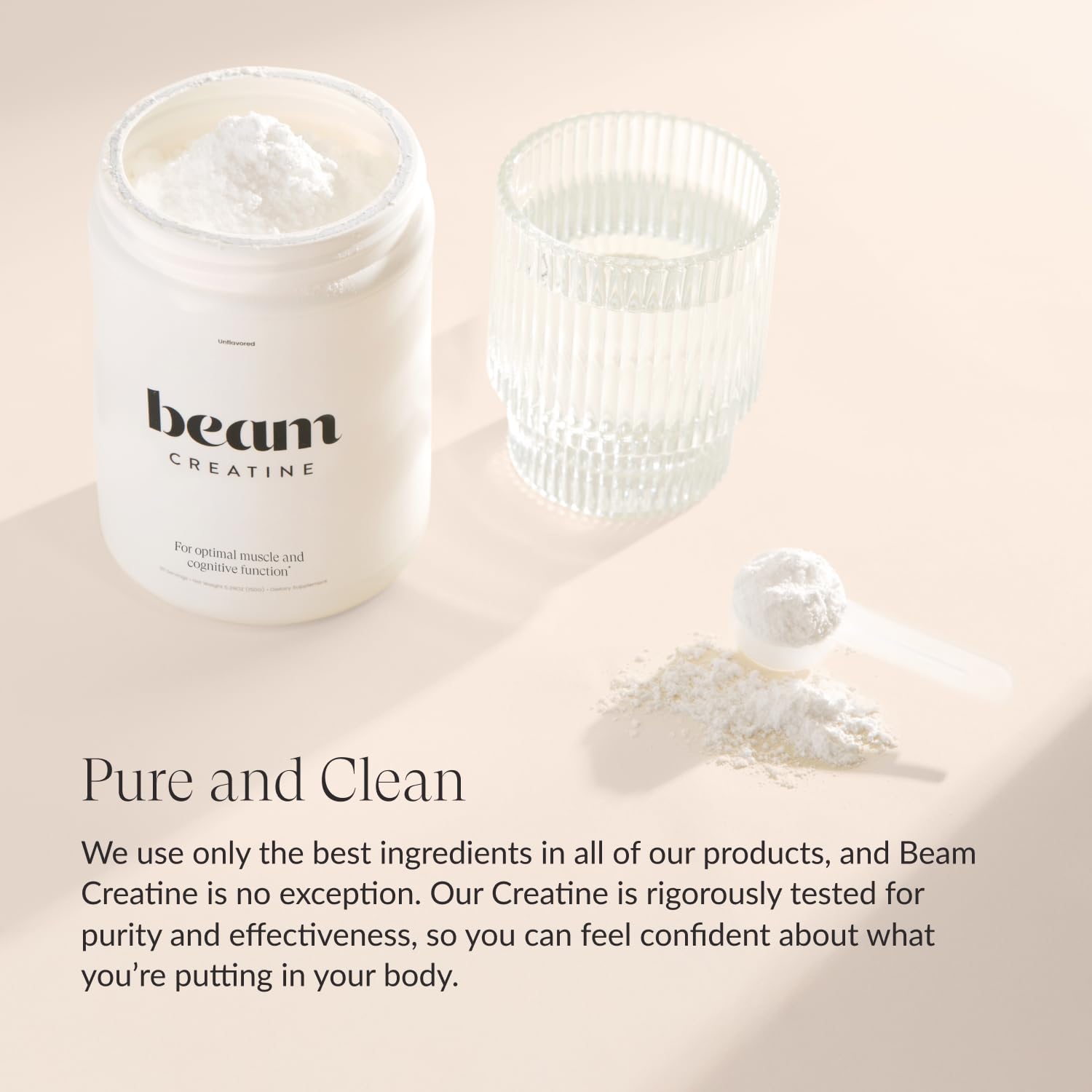 Beam Creatine Powder mixer glass illustrating easy dissolution in drinks.