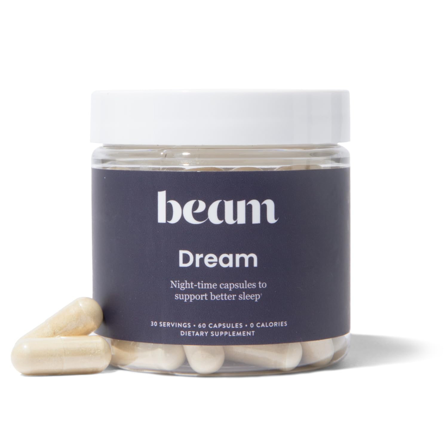 Beam Dream Sleep Capsules bottle on nightstand promoting natural relaxation.