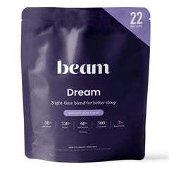 Beam Dream Sleep Powder bottle label highlights vegan, non-GMO formula for a peaceful night.