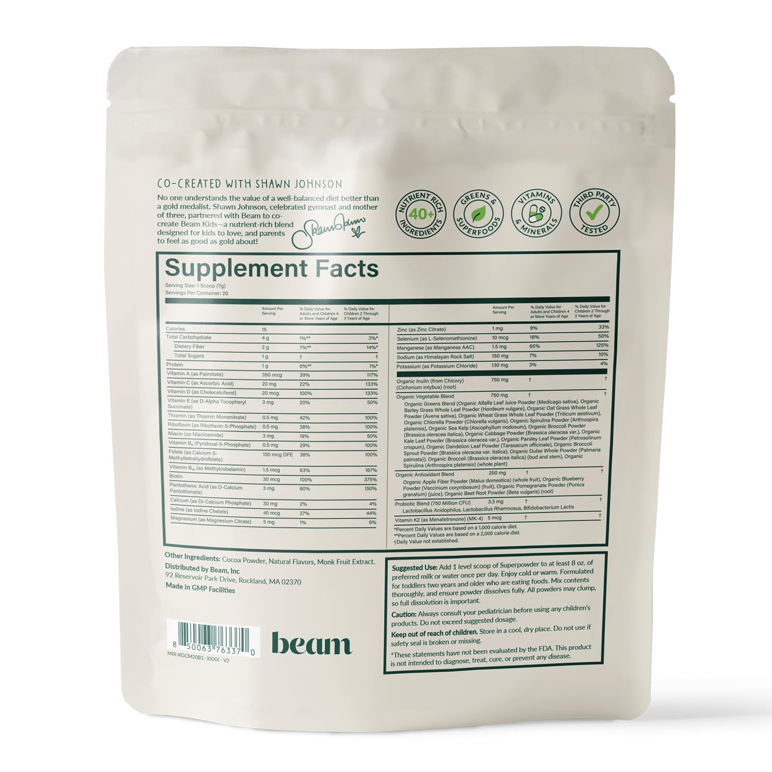 Happy child holding Beam Kids All-in-One Superfood Powder container