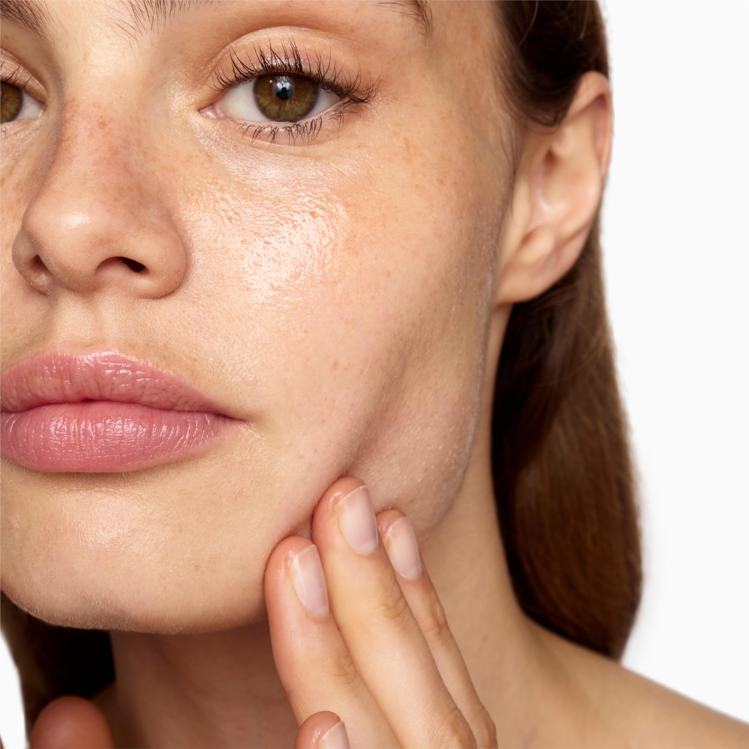 Product shot with bottle and dropper on a clean surface
