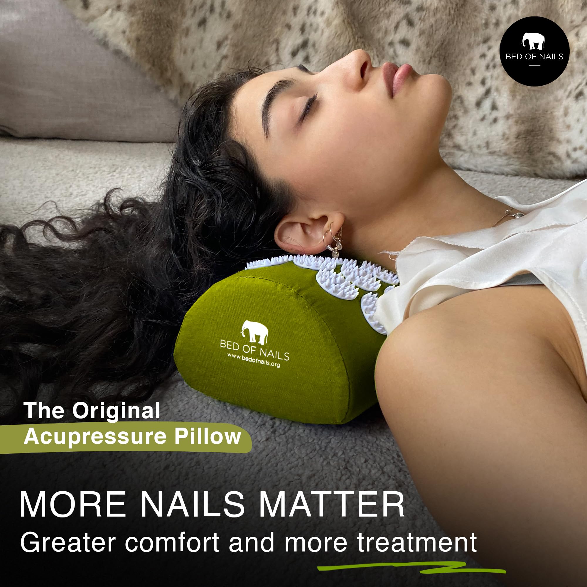 Close-up of green acupressure nails on BED OF NAILS lumbar pillow