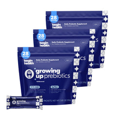 Begin Health Growing Up prebiotics powder in tub ready to pour for gentle stool comfort.