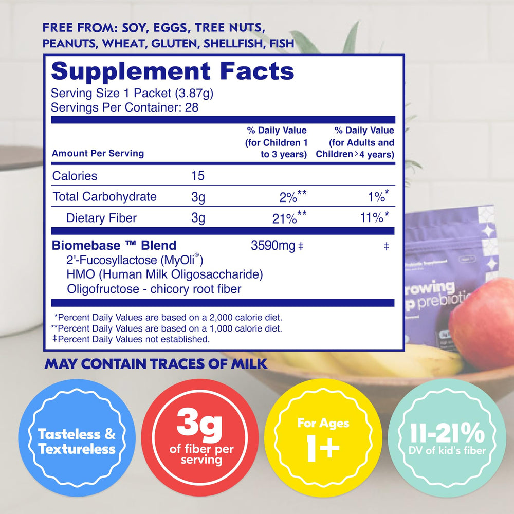 Begin Health Growing Up Prebiotics scoop beside the jar for easy mixing.