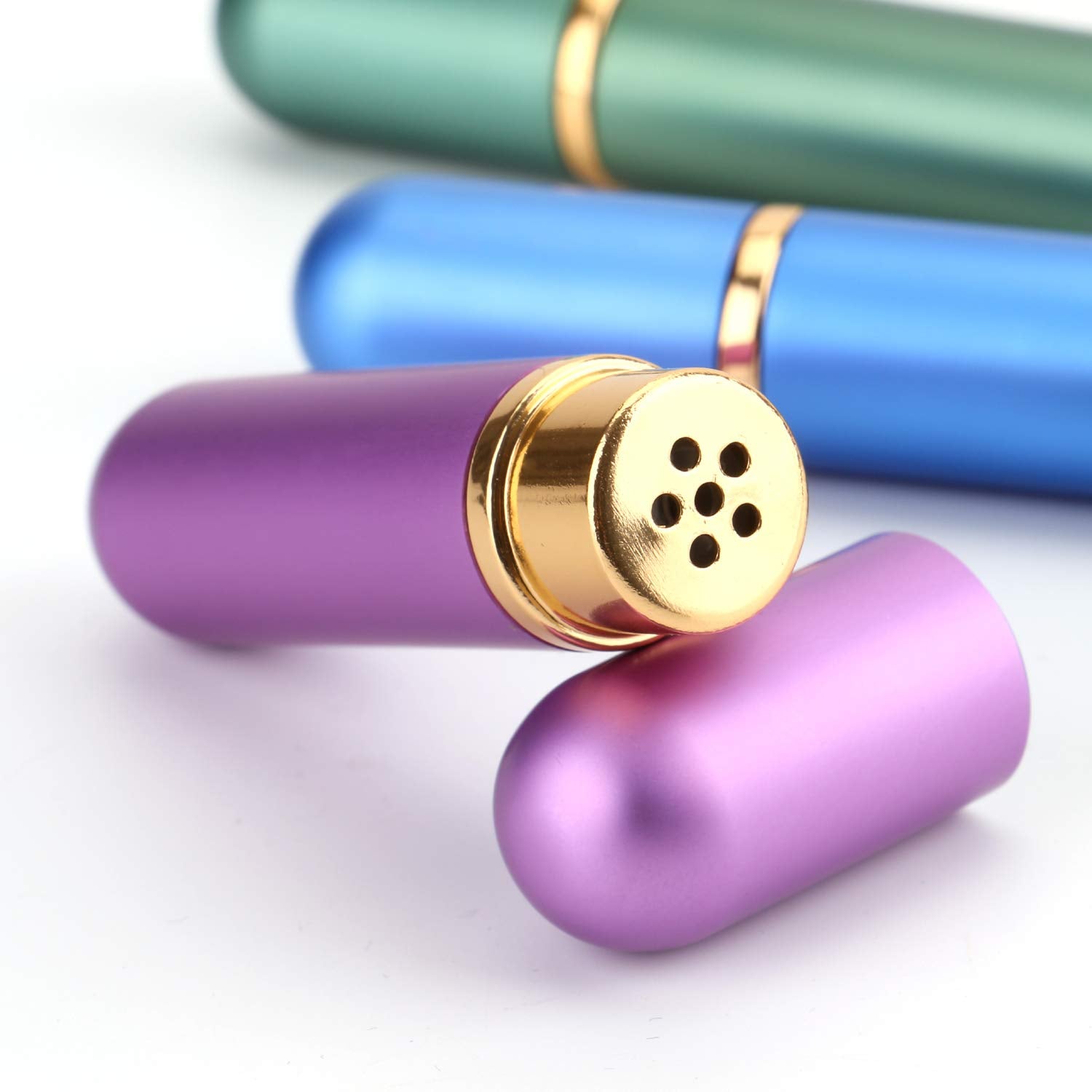 Close-up of aluminum nasal inhaler with glass inner tube