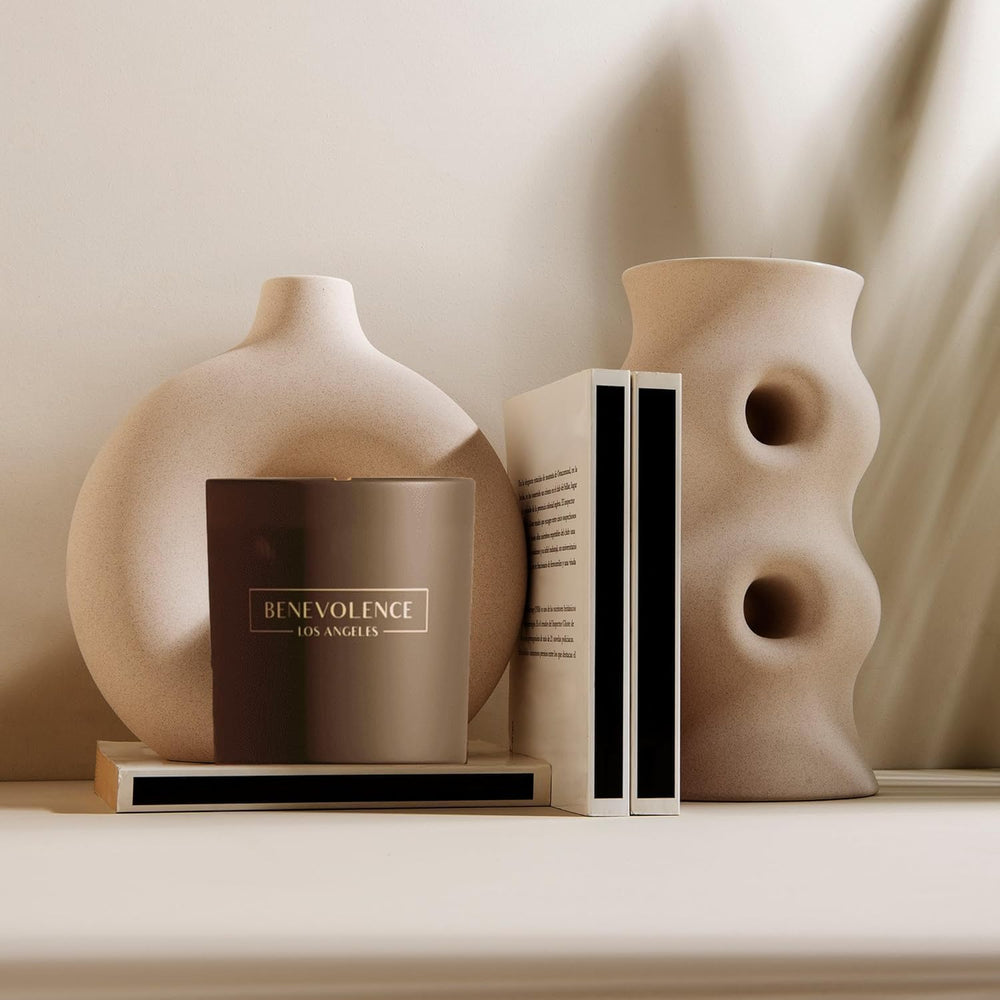 Label close-up: Bergamot & Jasmine scent on black candle jar