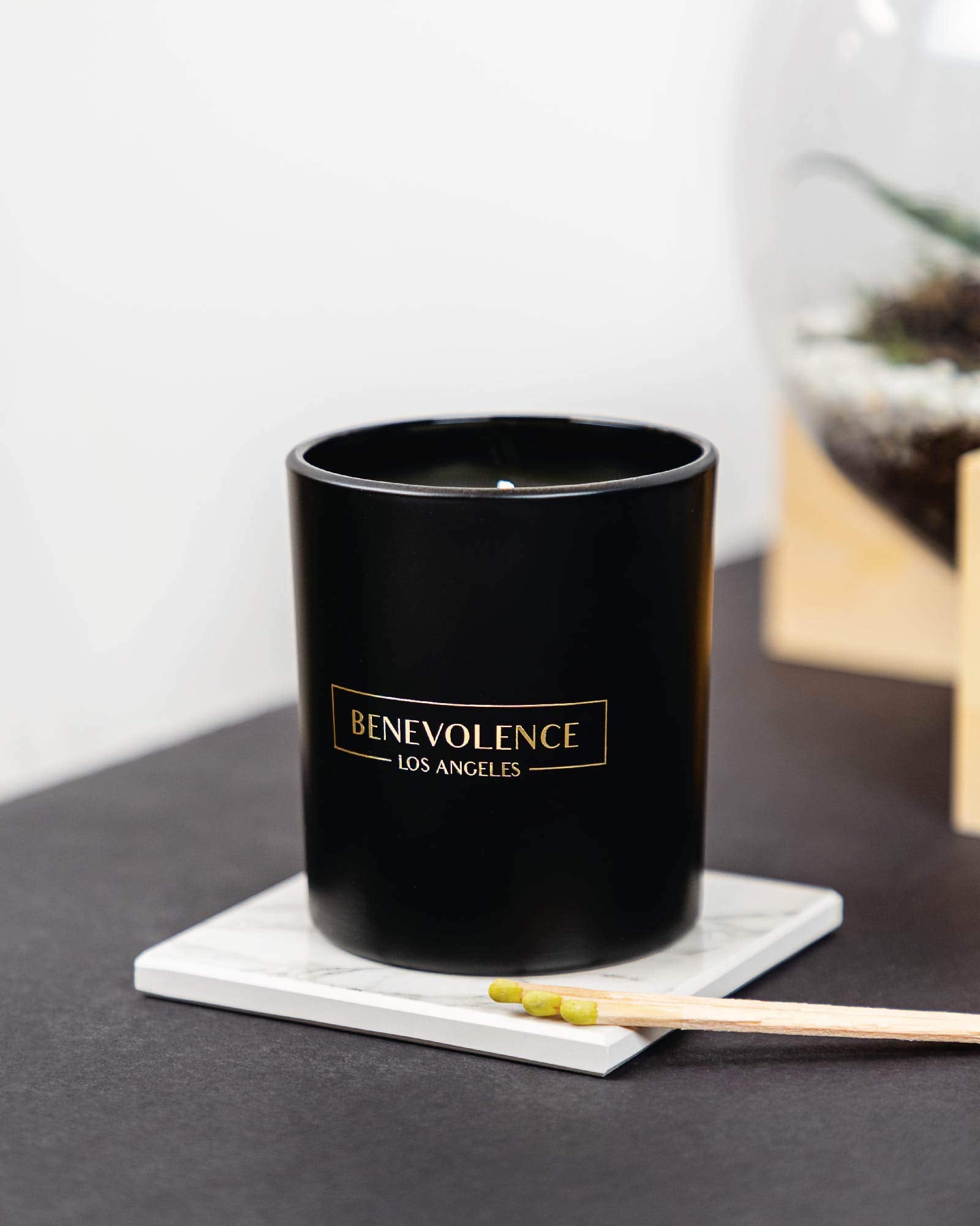 Front view of Benevolence LA Lavender & Lilac candle in black jar