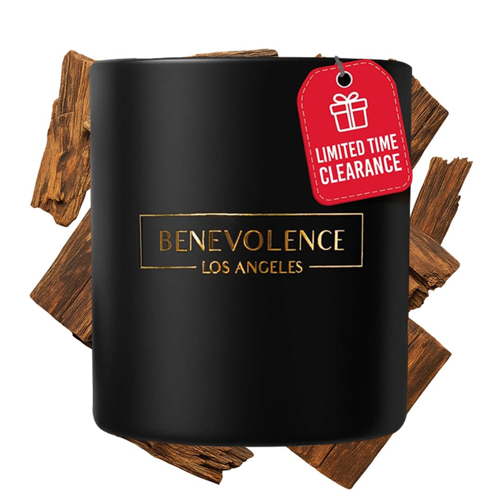 Hero shot of Benevolence LA Oud Wood Christmas Scented Candle in a black 8oz jar
