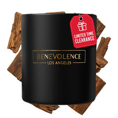Hero shot of Benevolence LA Oud Wood Christmas Scented Candle in a black 8oz jar