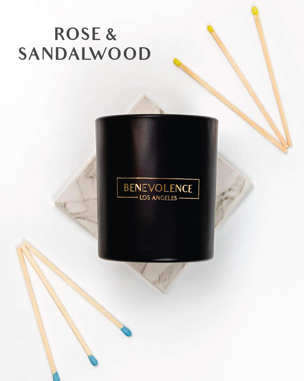 8oz black jar candle displaying rose and sandalwood notes