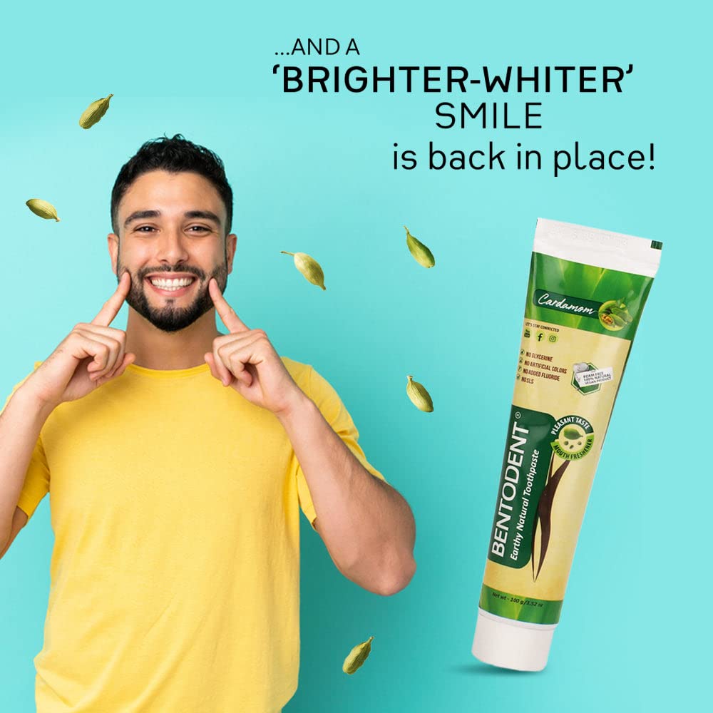 Person brushing teeth with Bentodent Cardamom toothpaste