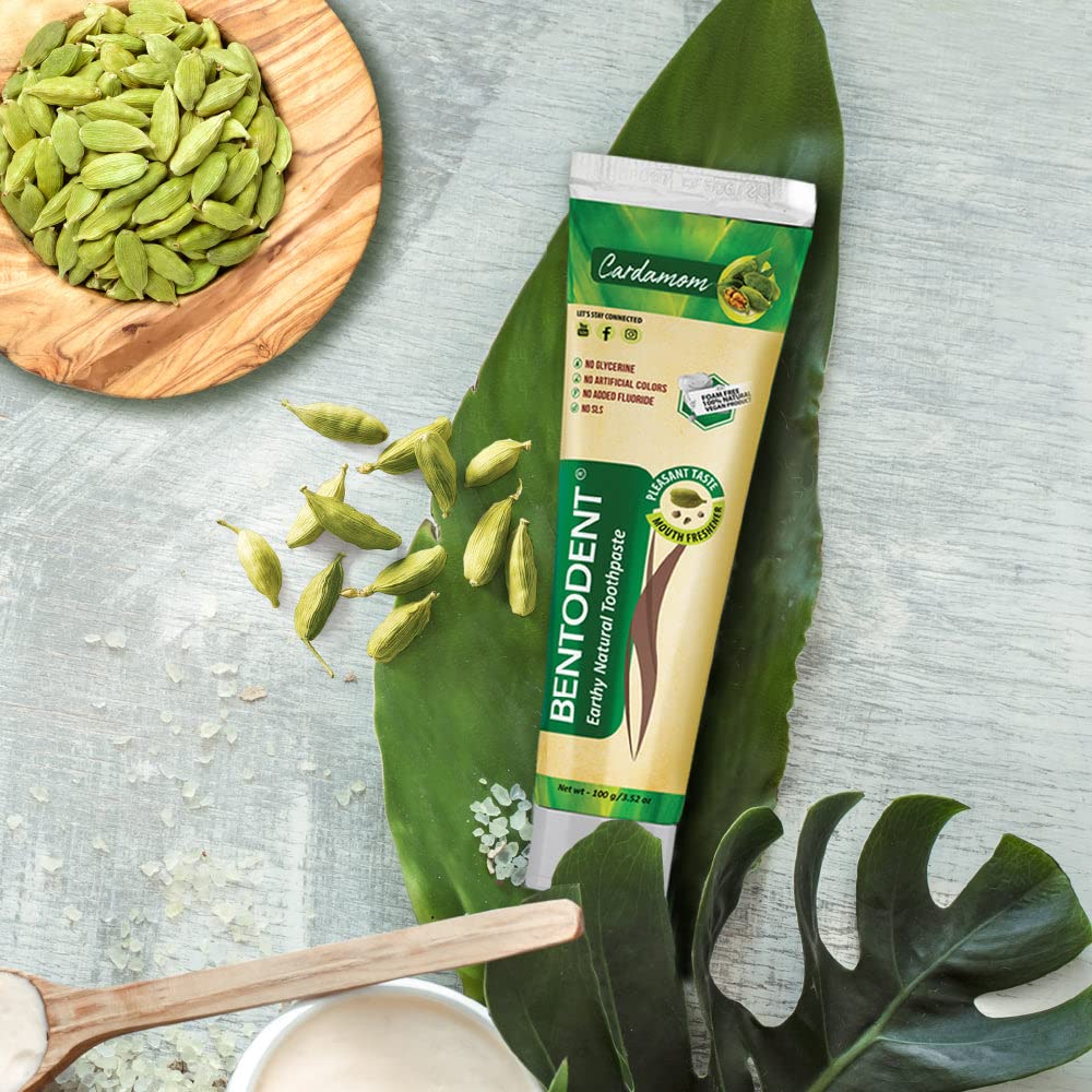 Child brushing teeth with Bentodent natural toothpaste Cardamom flavor