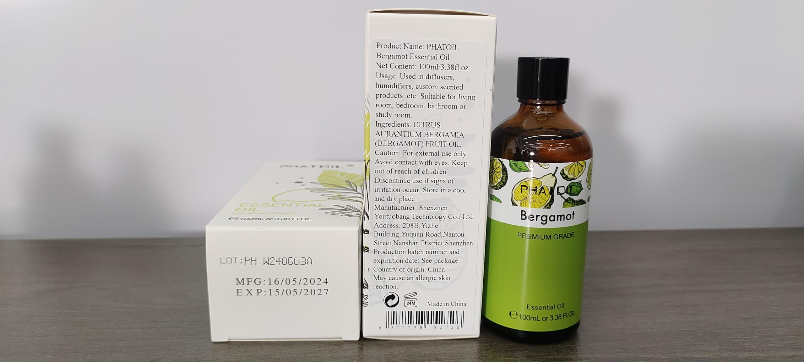 Product label close-up on bergamot essential oil bottle