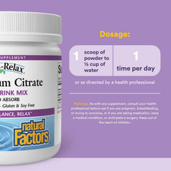 Serving scoop of Berry magnesium citrate powder in a glass