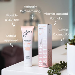 Close-up of Detoxify toothpaste tube label highlighting fluoride-free and SLS-free formula