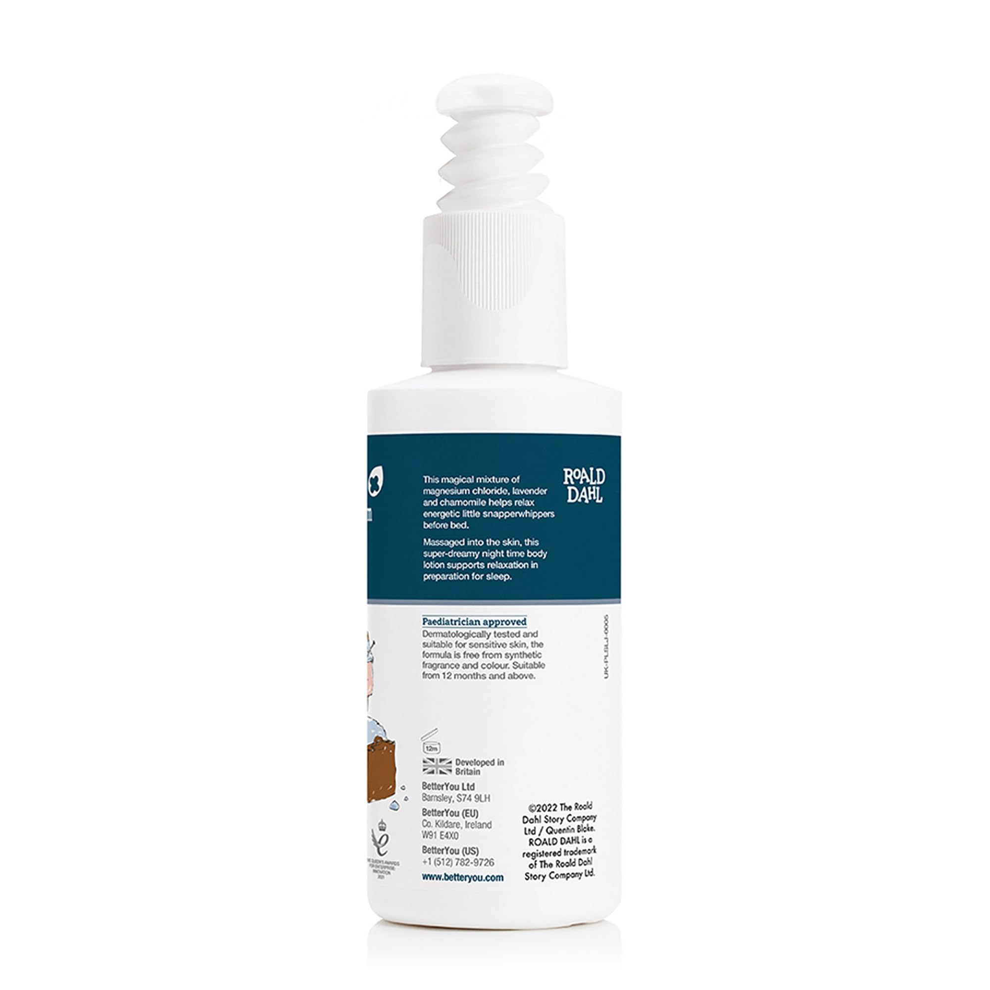 Chamomile flowers beside the lotion bottle