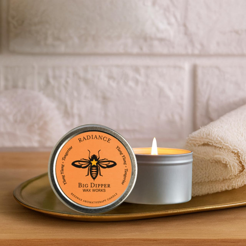 Big Dipper Wax Works candle tin close-up reveals beeswax texture