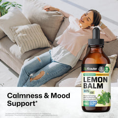Dropper dispensing lemon balm tincture into liquid