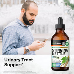 Nettle root extract liquid drops on a wooden surface