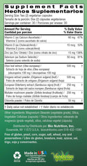 Flat lay of Immune Wellness bottle with greens