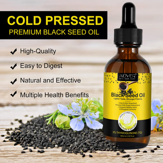 Close-up of organic cold-pressed black seed oil bottle