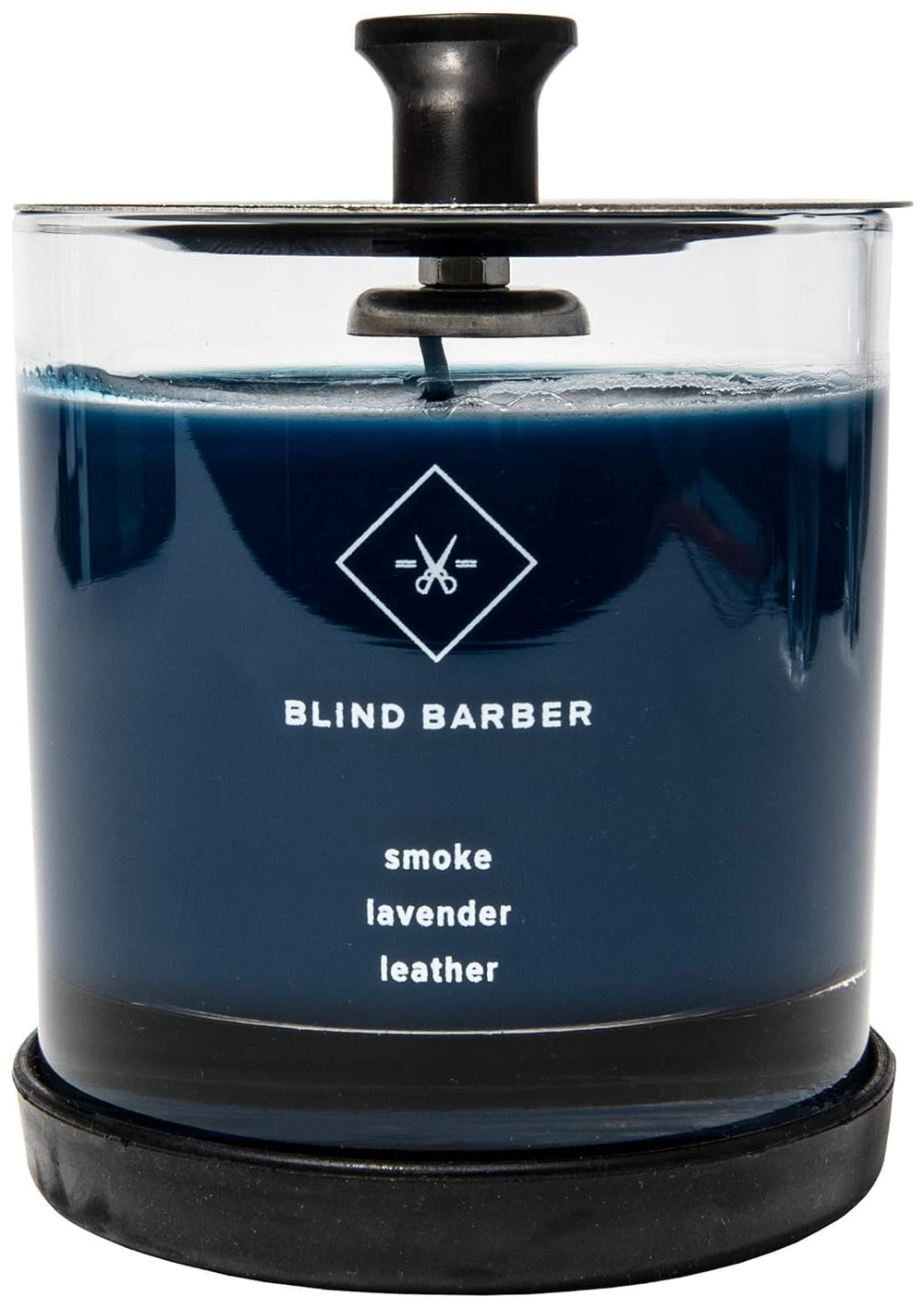Blind Barber Tompkins candle with smoke and leather notes creates a bold room ambiance.