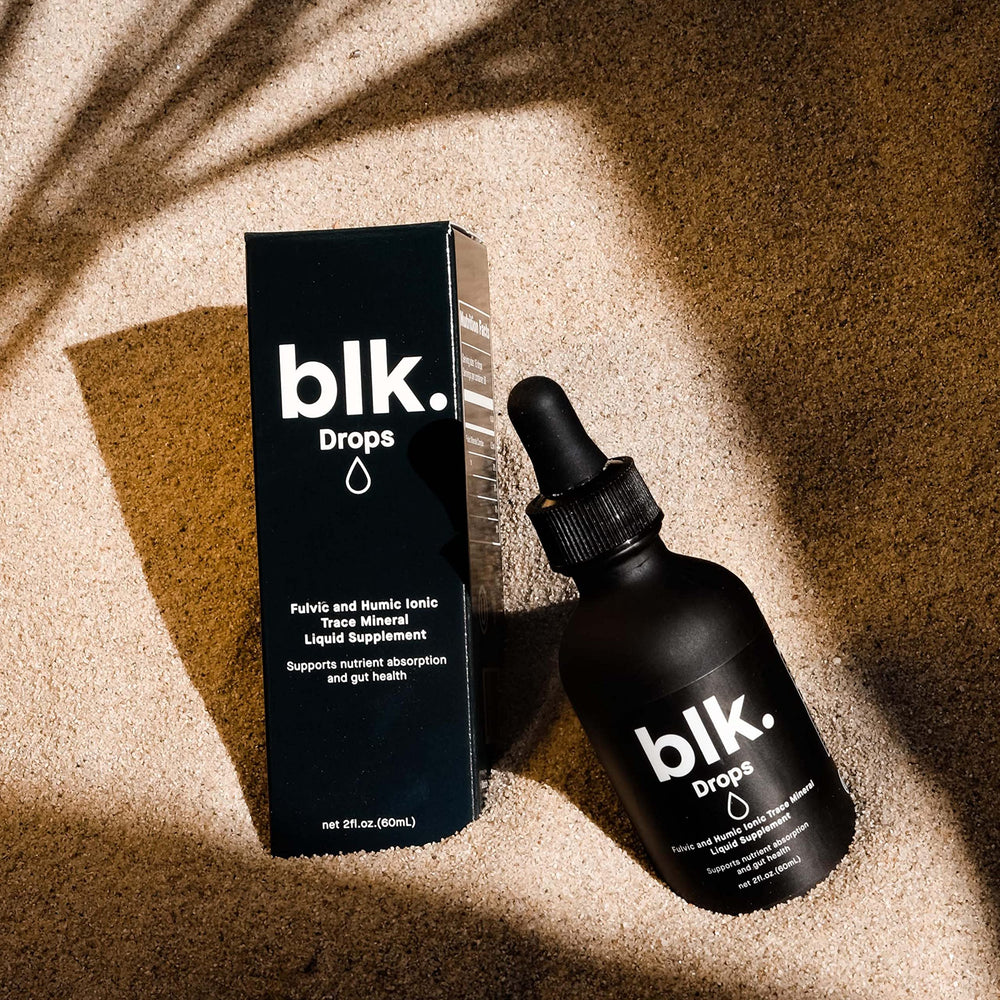 Product packaging of blk. PH 8+ mineral water drops 2oz