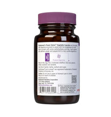 Close-up of Power-Zymes capsules with ginger and peppermint