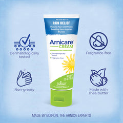 Boiron Arnicare Cream application on hand demonstrates easy rub-in for targeted soreness.