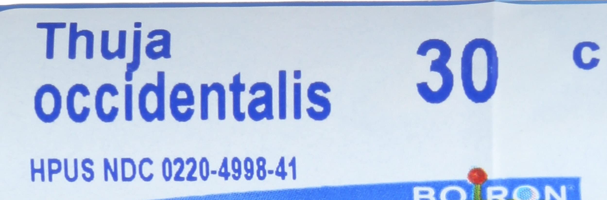 Product packaging with tube and label on white background