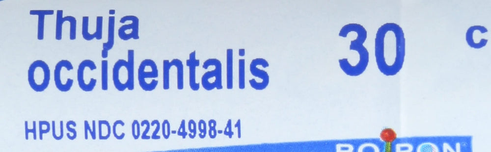 Close-up of Boiron logo on the bottle label