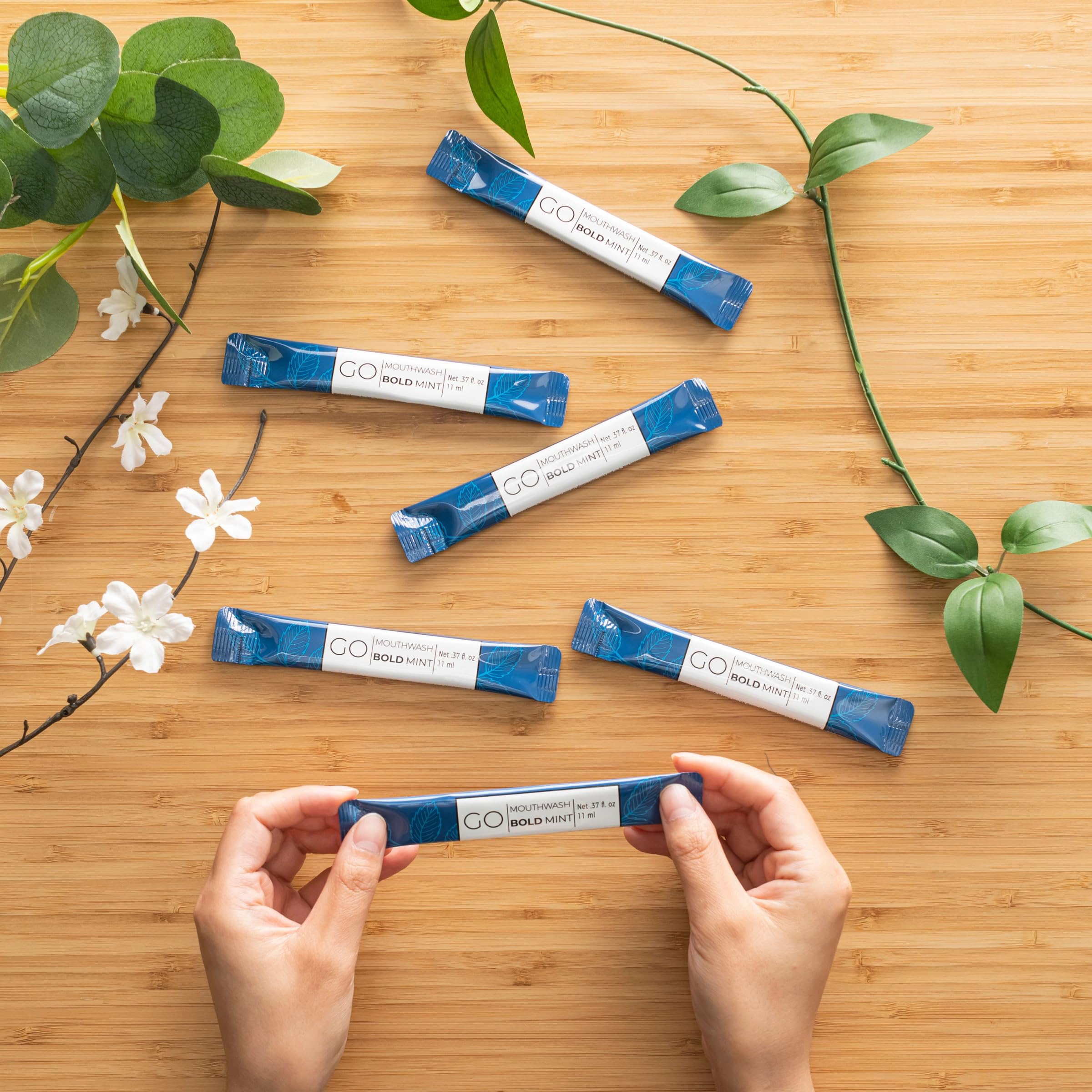 Individually wrapped spill-proof mouthwash packets with natural formula