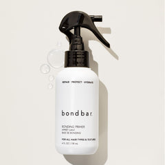 Bondbar Repair Treatment creamy-texture close-up highlights rich, lightweight hydration.