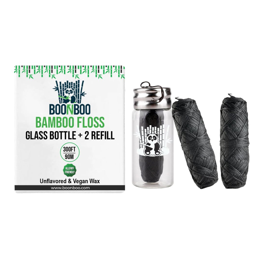 Charcoal woven dental floss with glass bottle - front view