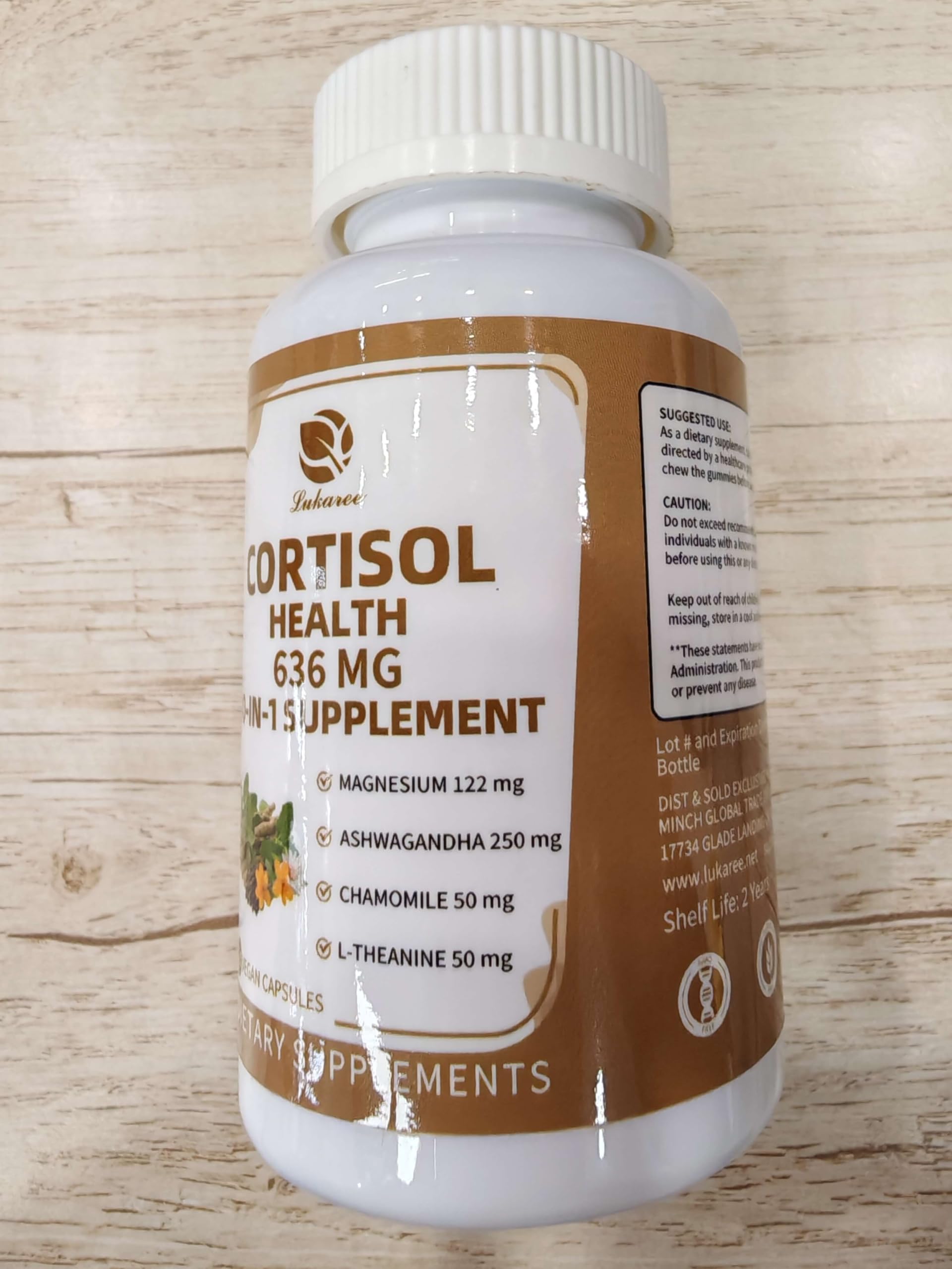 Cortisol supplement bottle displayed on wood background