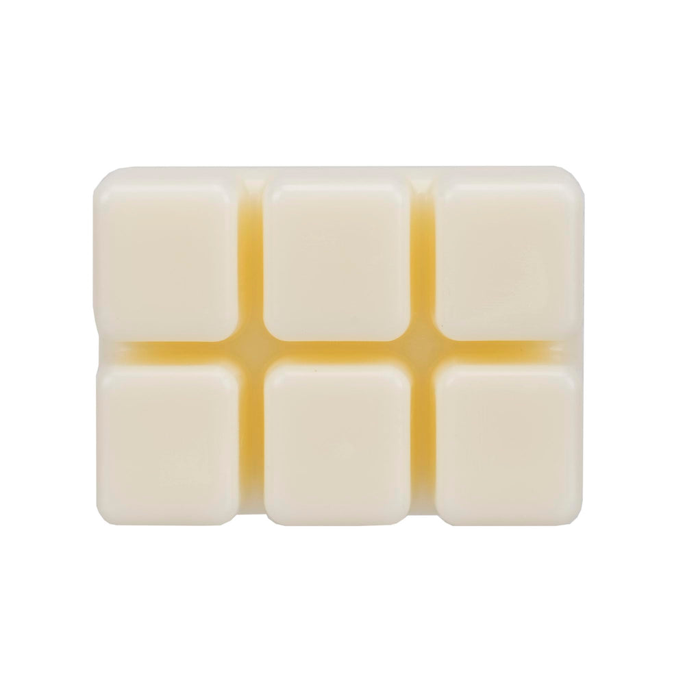 Bourbon Royalty Versailles wax cubes in a warmer demonstrate flame-free fragrance diffusion.